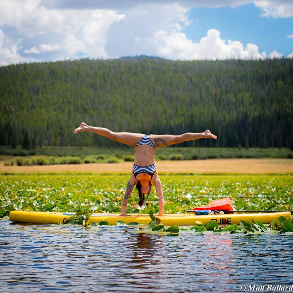 yoga on a stand up paddle board