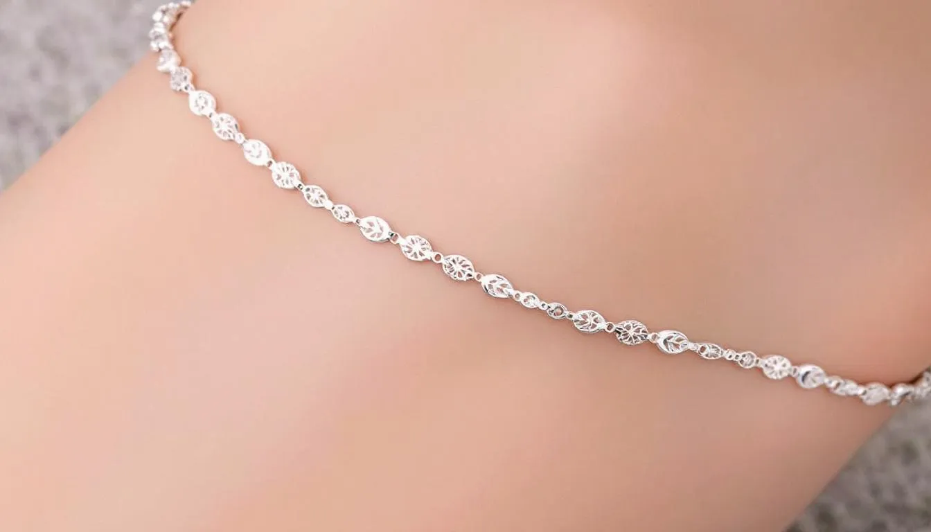 The image showcases a stunning collection of sterling silver anklets, featuring delicate charms that enhance their elegance and style. Each piece, crafted from high-quality sterling silver, is designed to elevate any outfit, making it an ideal accessory for those looking to add a touch of sophistication to their look.