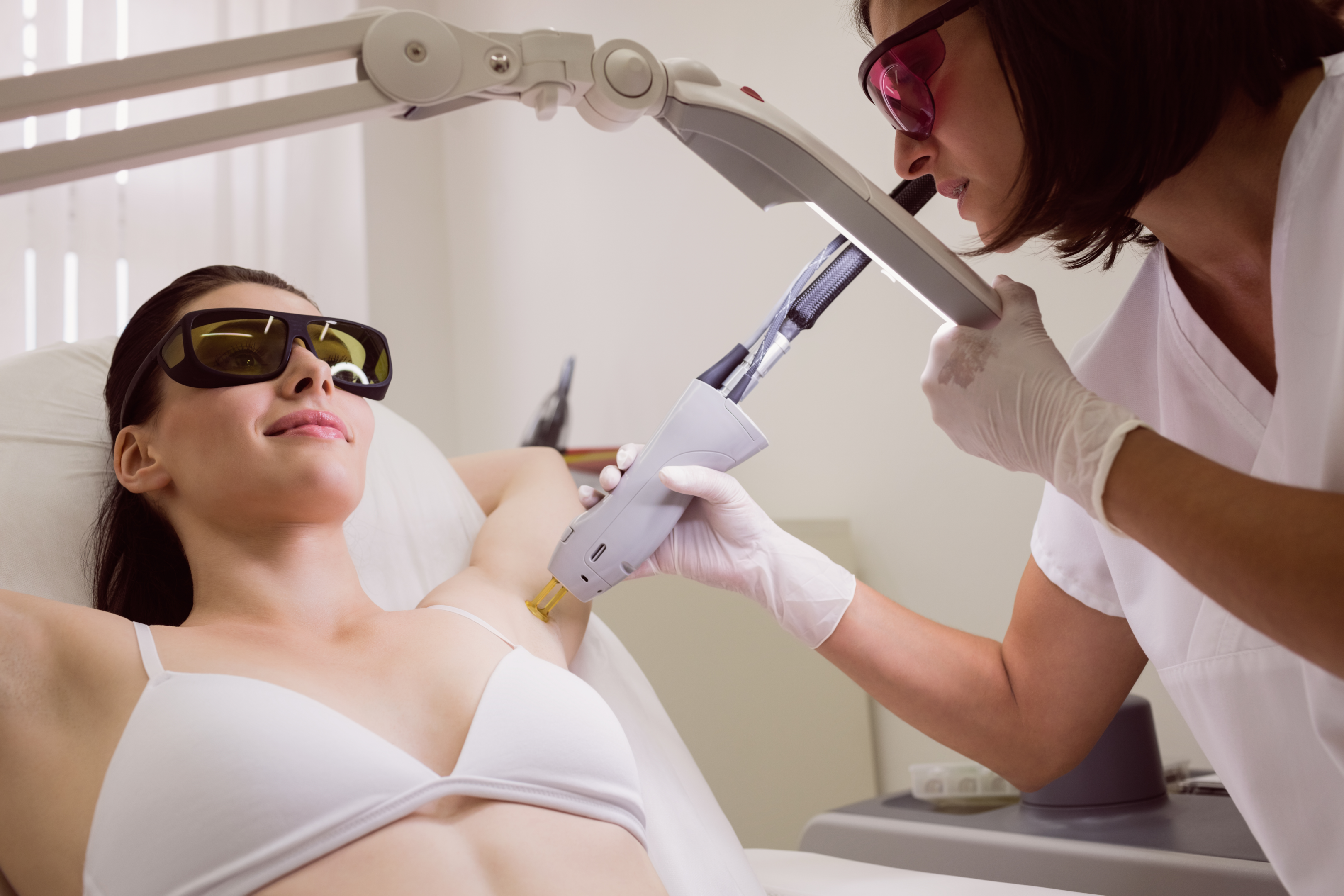 A girl receiving laser treatment.