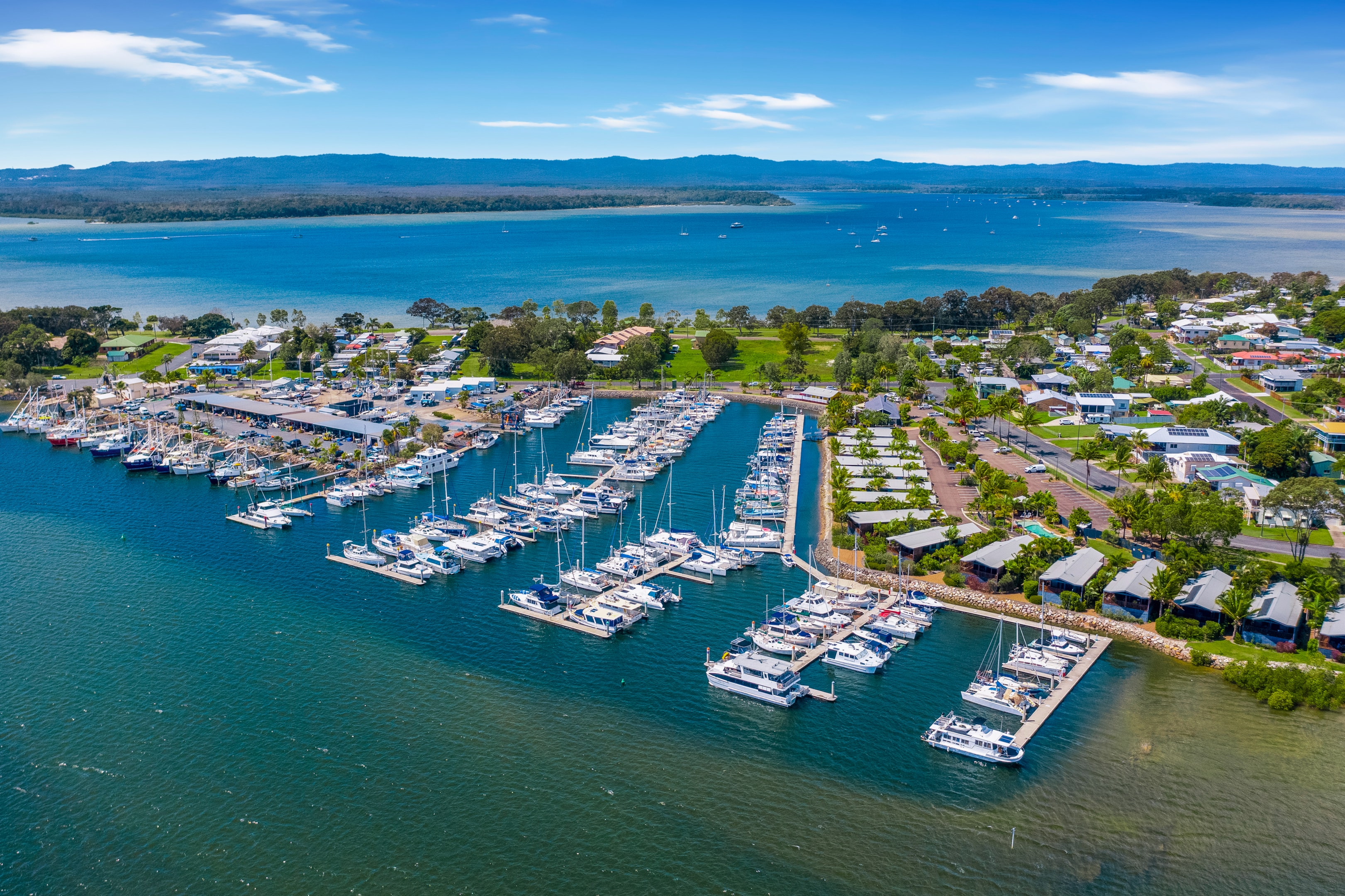 The Tin Can Bay Marina is relatively small compared to nearby Urangan Boat Harbour