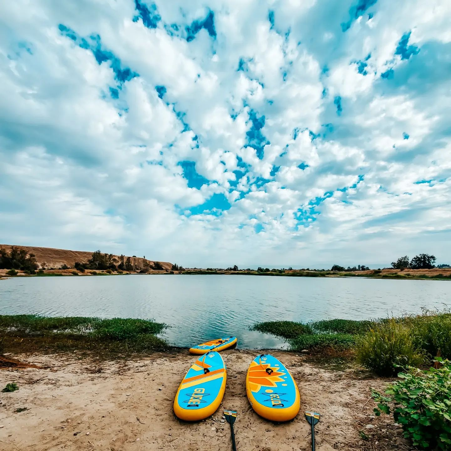 two inflatable paddle boards