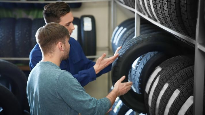 A person assessing their driving needs to choose the perfect tires for their vehicle