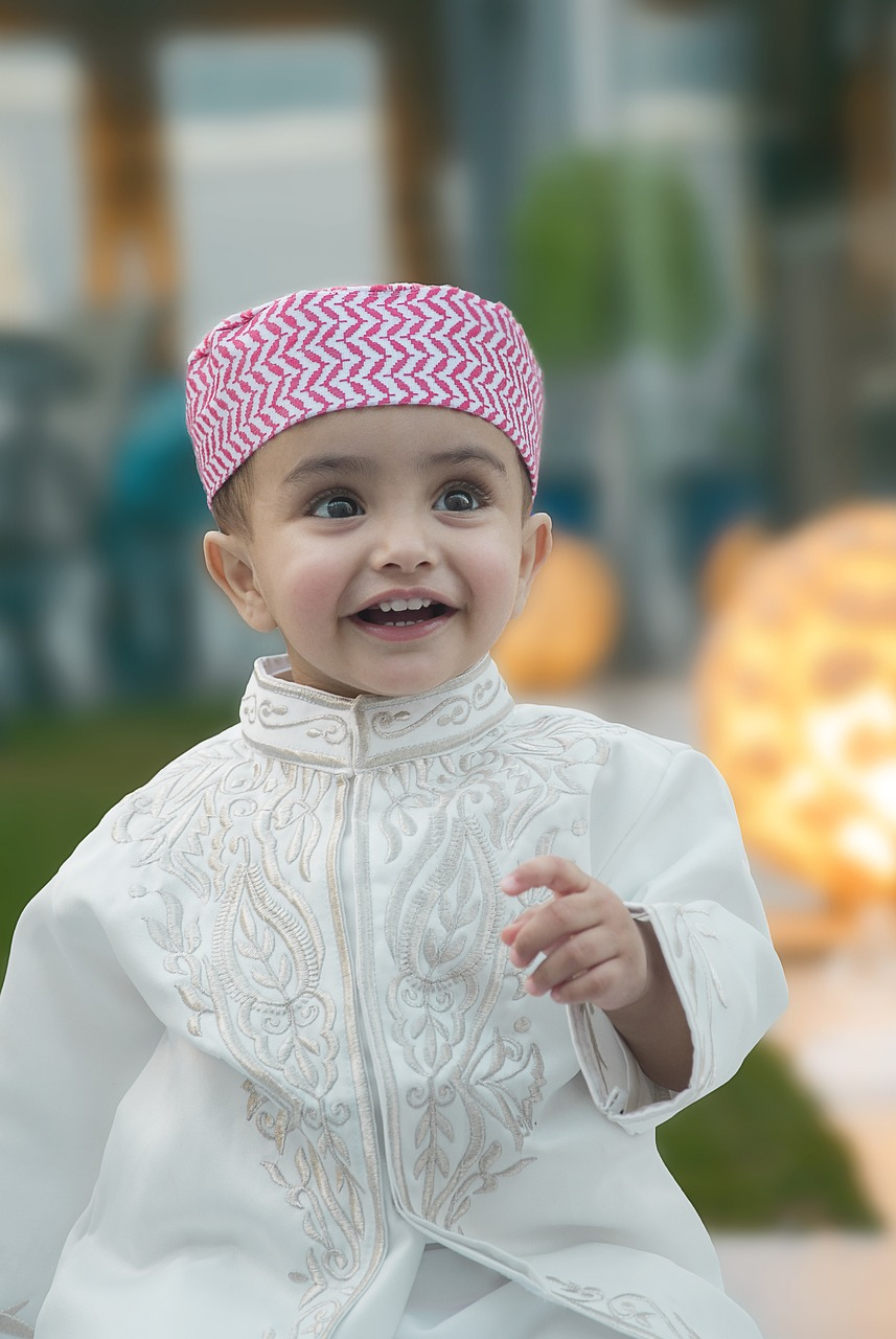 A child playing with a toy as a gift for Eid