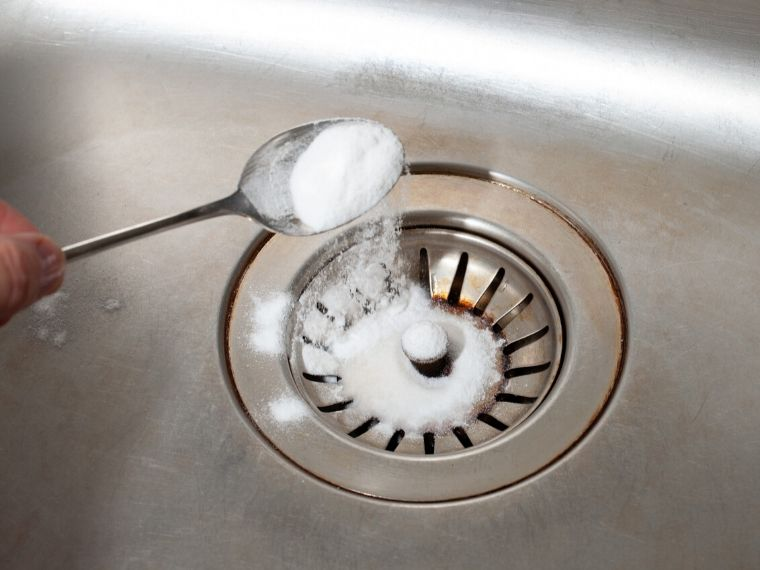 Sprinkle some baking soda on the drain