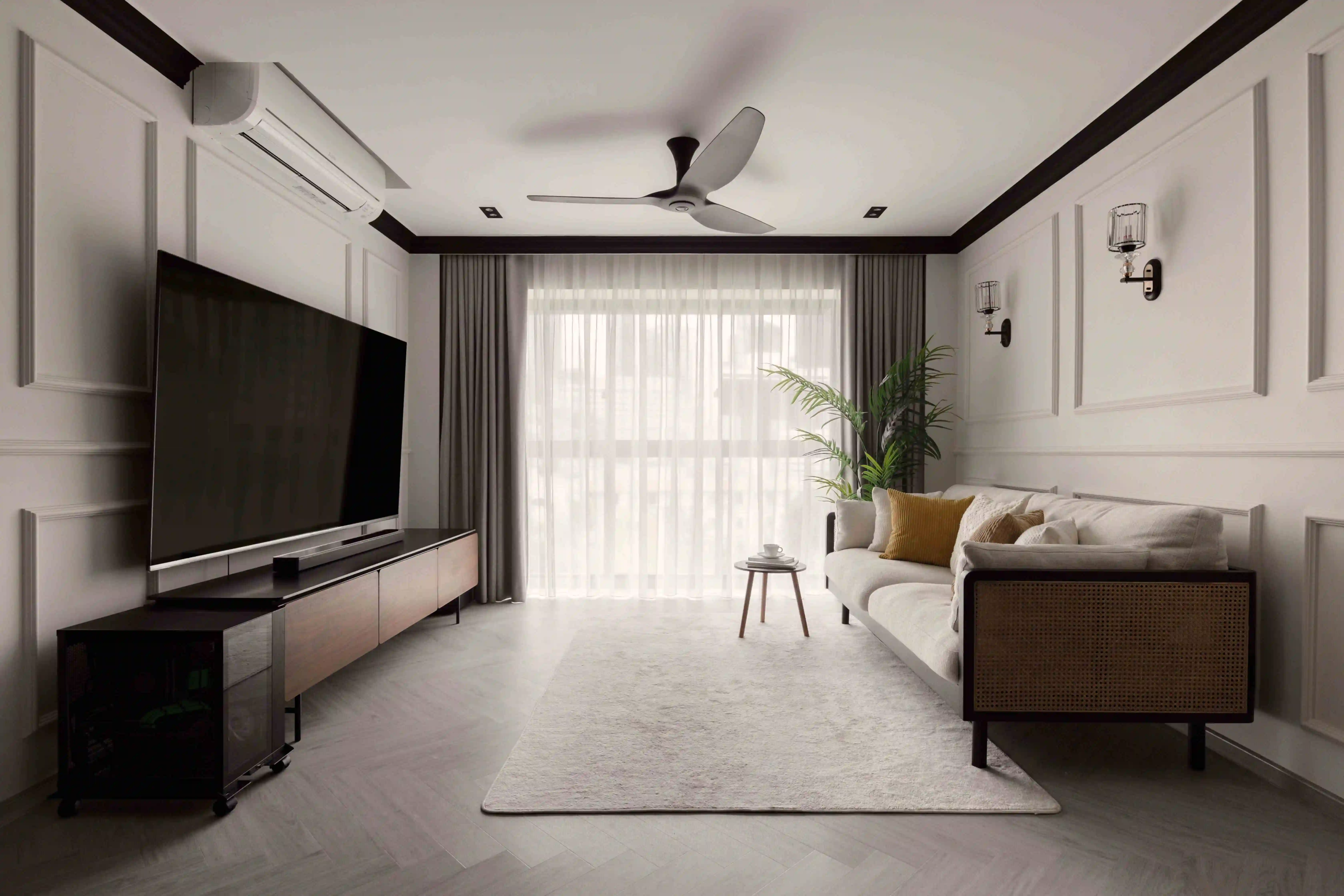 Small sitting room design with floor-to-ceiling sheer curtains, wall sconces and cane-sided sofa.
