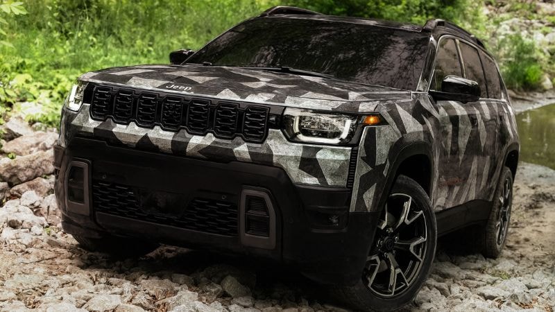 A Jeep wrapped in urban camo wrap