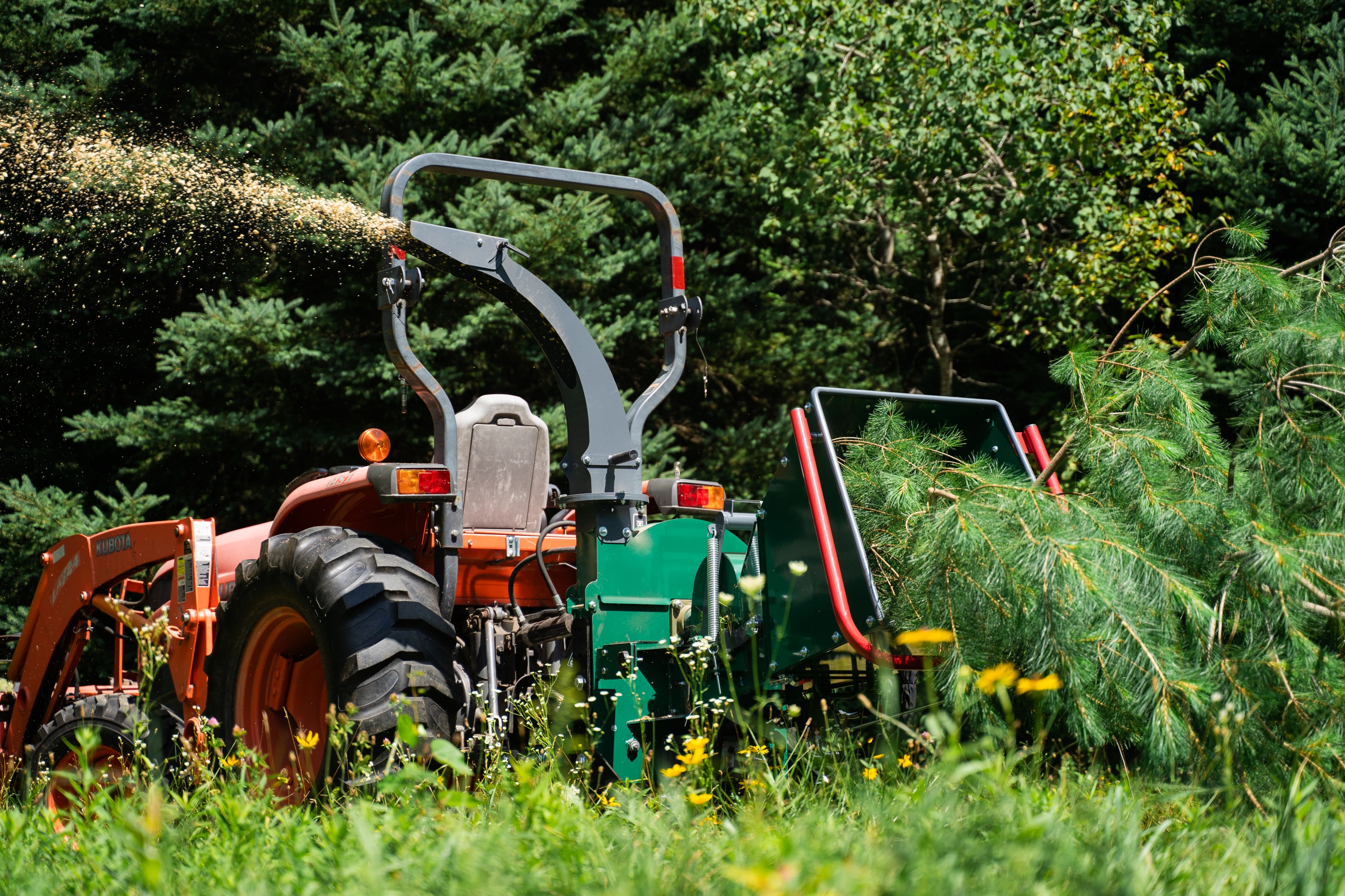 A Woodland Mills TF810 PRO Wood Chipper turning a whole tree into mulch.