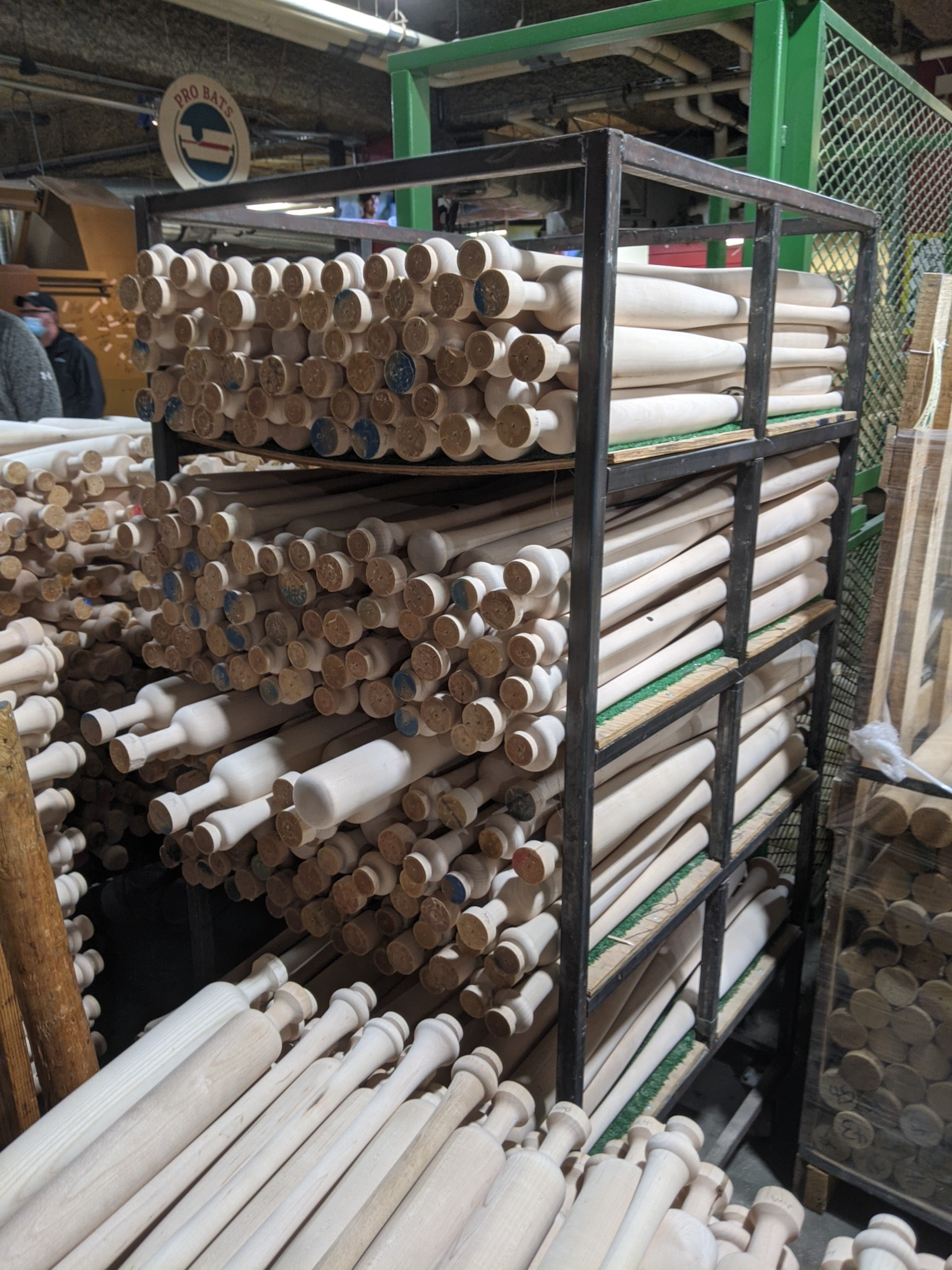 A rack of wooden bats about to be manufactured.