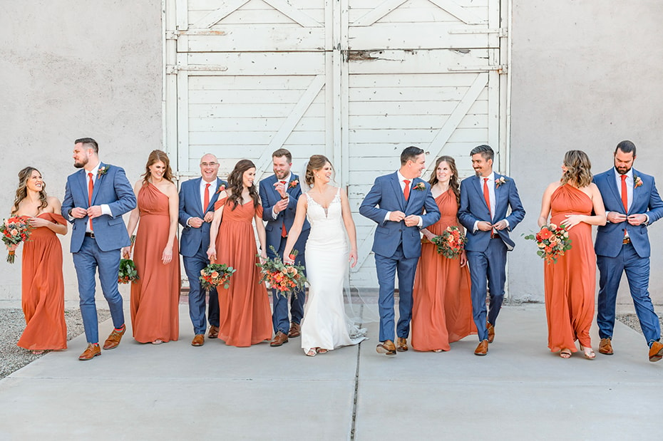 Fun group photo of the bridal party celebrating together.