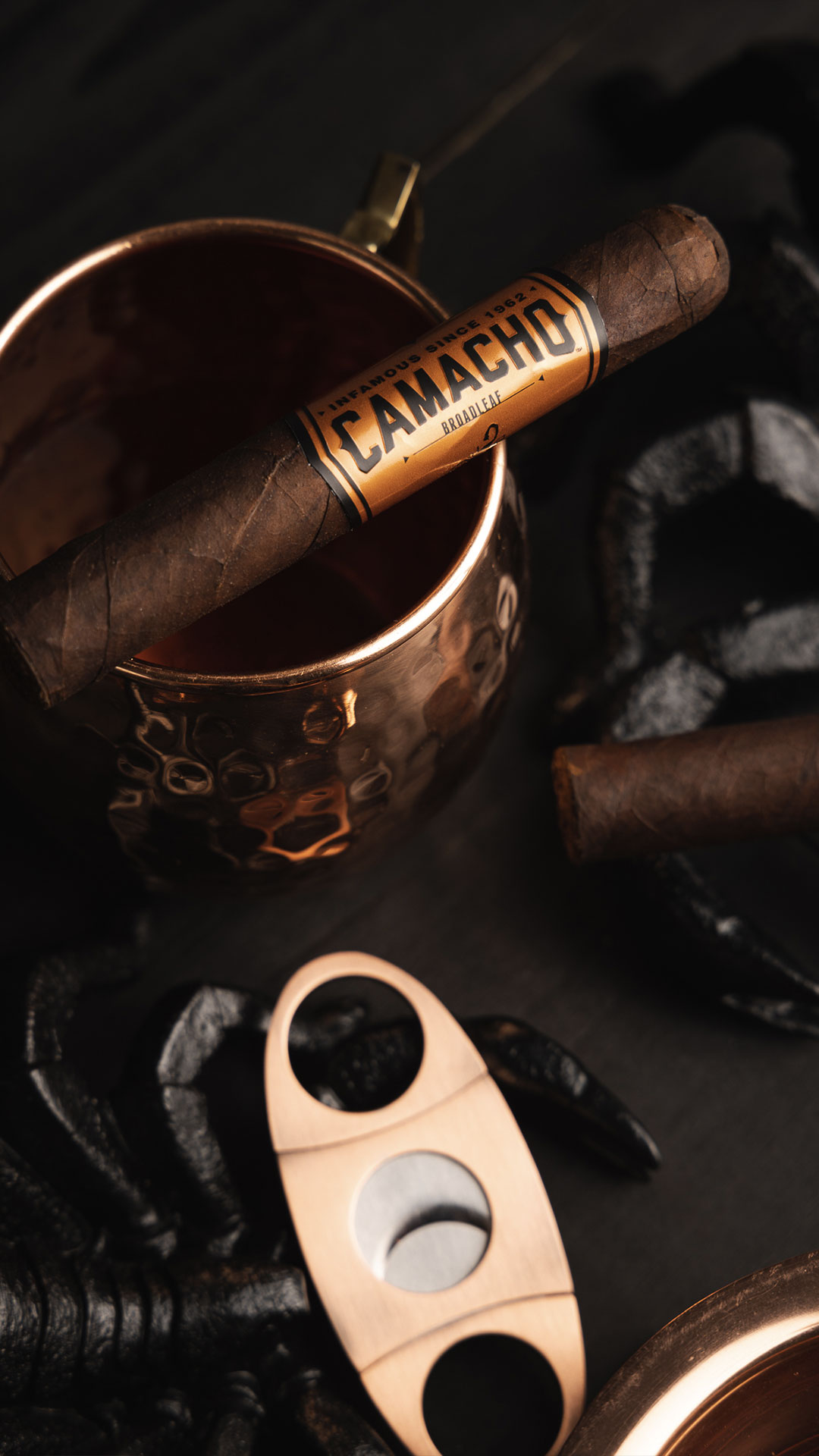 A Camacho Broadleaf cigar with a Honduran Broadleaf wrapper and a Honduran Broadleaf binder