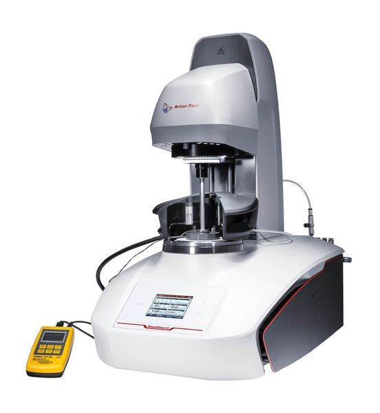 A picture of a dynamic shear rheometer being used to measure the rheological properties of asphalt binder samples