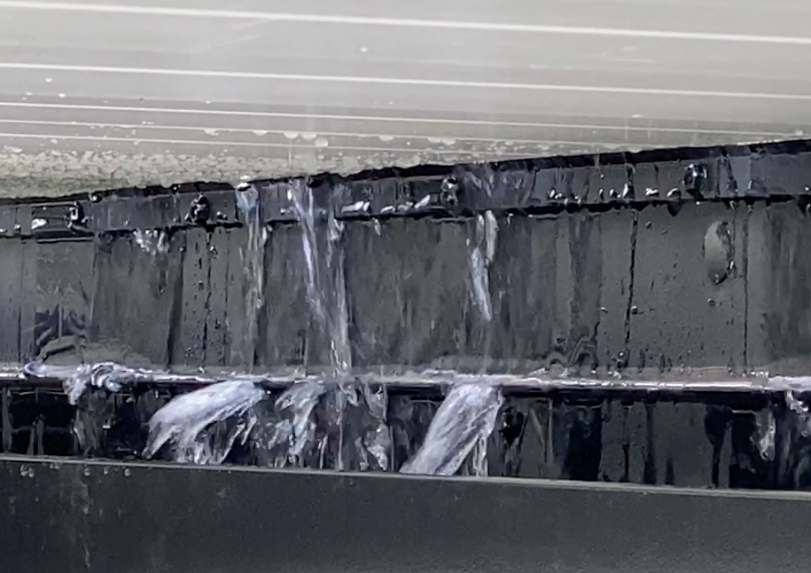 water falling into gutter system on any size pergola size