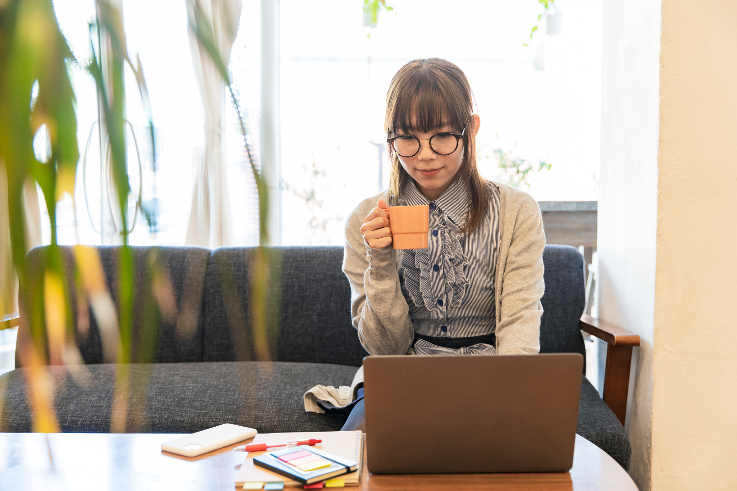 Remote employee working remotely on laptop.