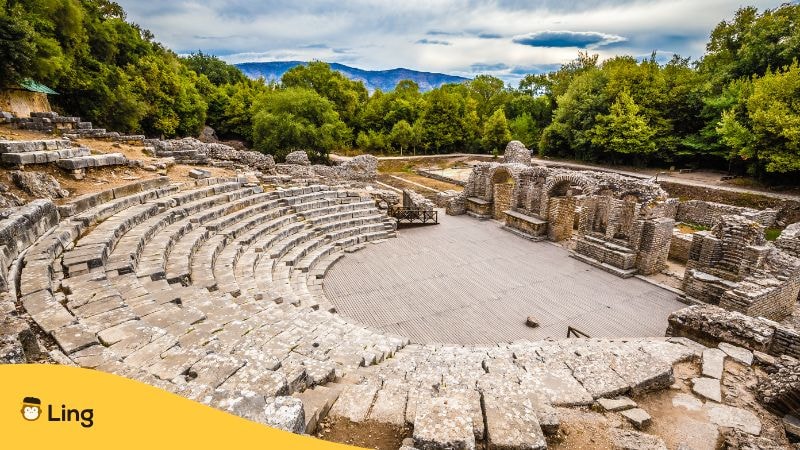 Ancient ruins of Butrint, featuring well-preserved Greek, Roman, Byzantine, and Venetian architectural remnants, including a theater, temples, and city walls, reflecting the site's historical significance