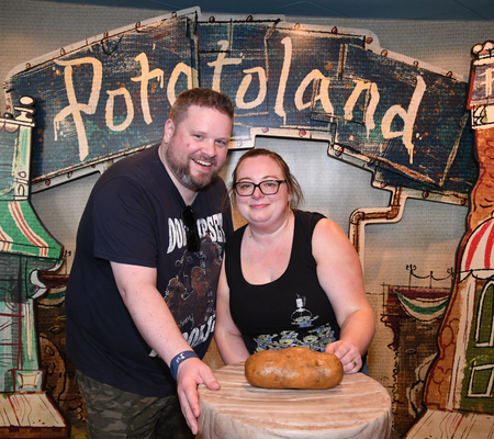 Having our photo taken at Potatoland at Disney's Hollywood Studios