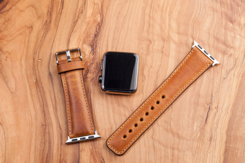 An image of a person wearing an Apple Watch with a band of different brands