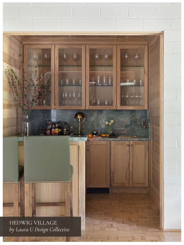 This green and pale wood home bar in our Hedwig Village, TX project is both comfortable and the height of sophistication