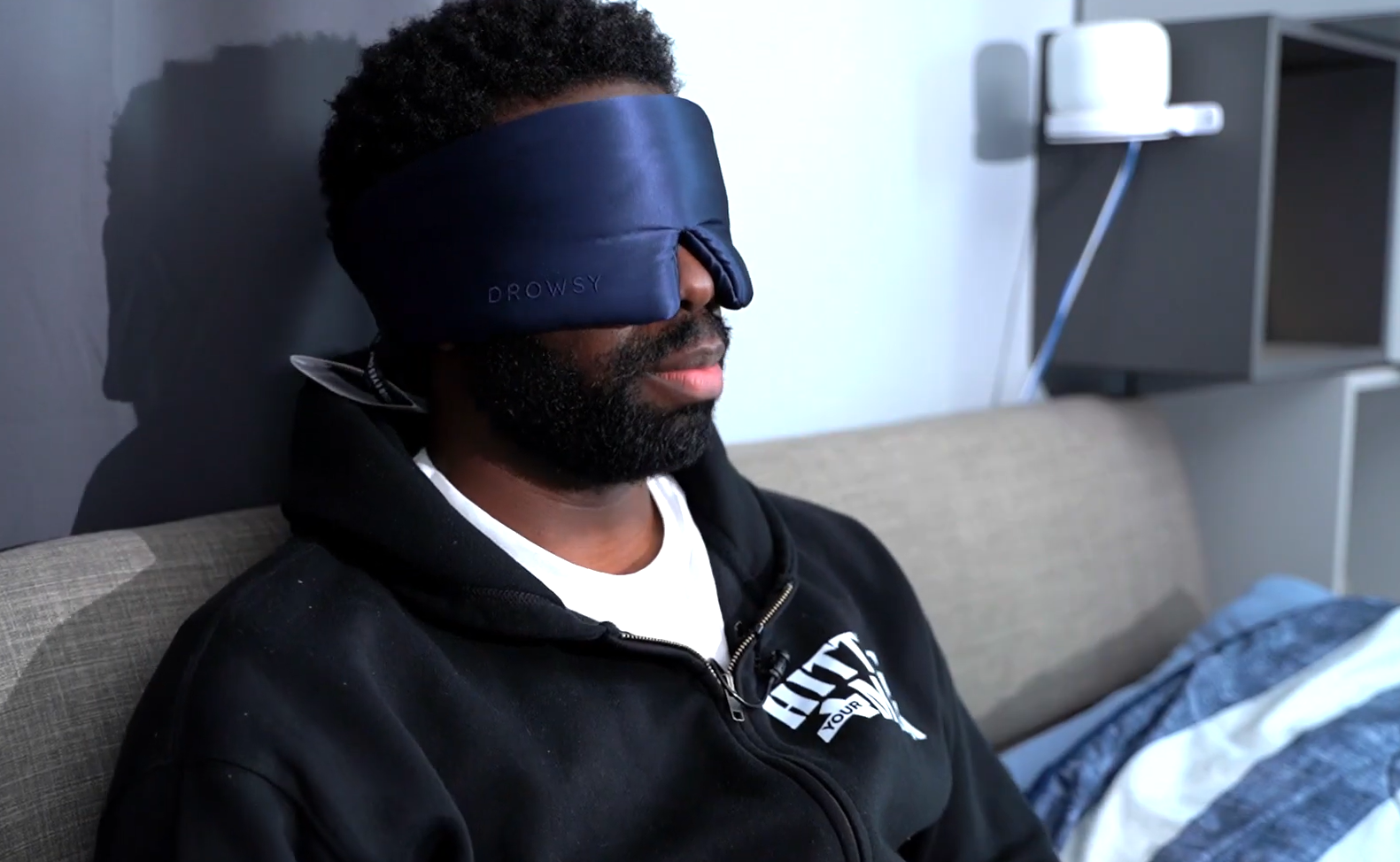 trying the drowsy sleep mask in the bed