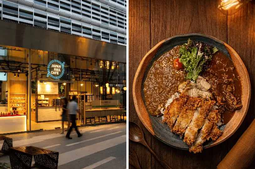 A split view showing the modern, street-facing exterior of Japan Rail Cafe with its glowing blue sign on the left, and a top-down shot of a beautifully plated Japanese katsu and beef curry dish resting on a rustic wooden table on the right.