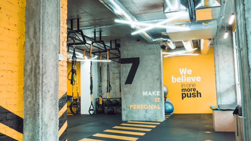 Custom Vinyl Wall Decals in A Gym With Quotes
