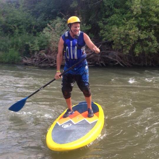 inflatable sup board on the river