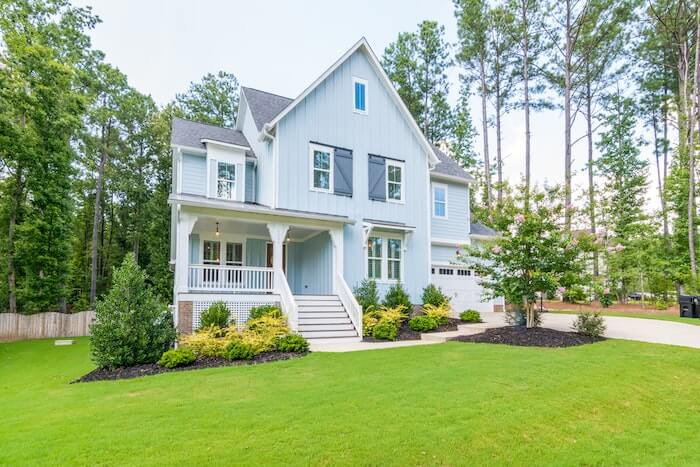 Blue house on Airbnb rental arbitrage property