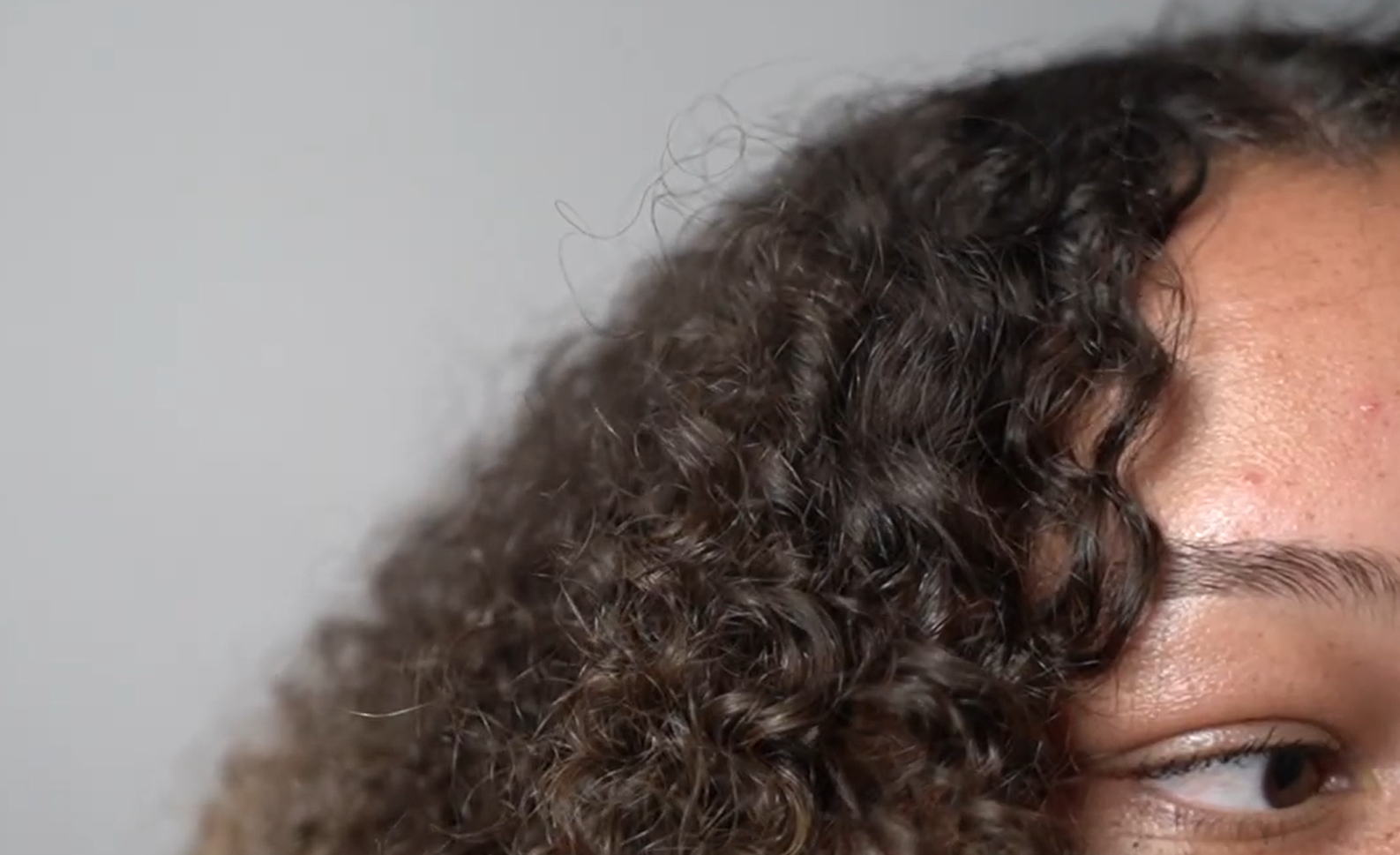 unruly strands of hair showing up