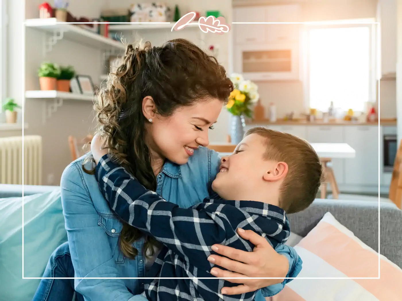 Mother and son hugging in the living room, fabulous flowers and gifts