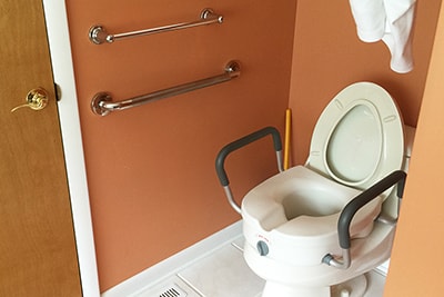 Combining Raised Toilet Seats and Grab Bars