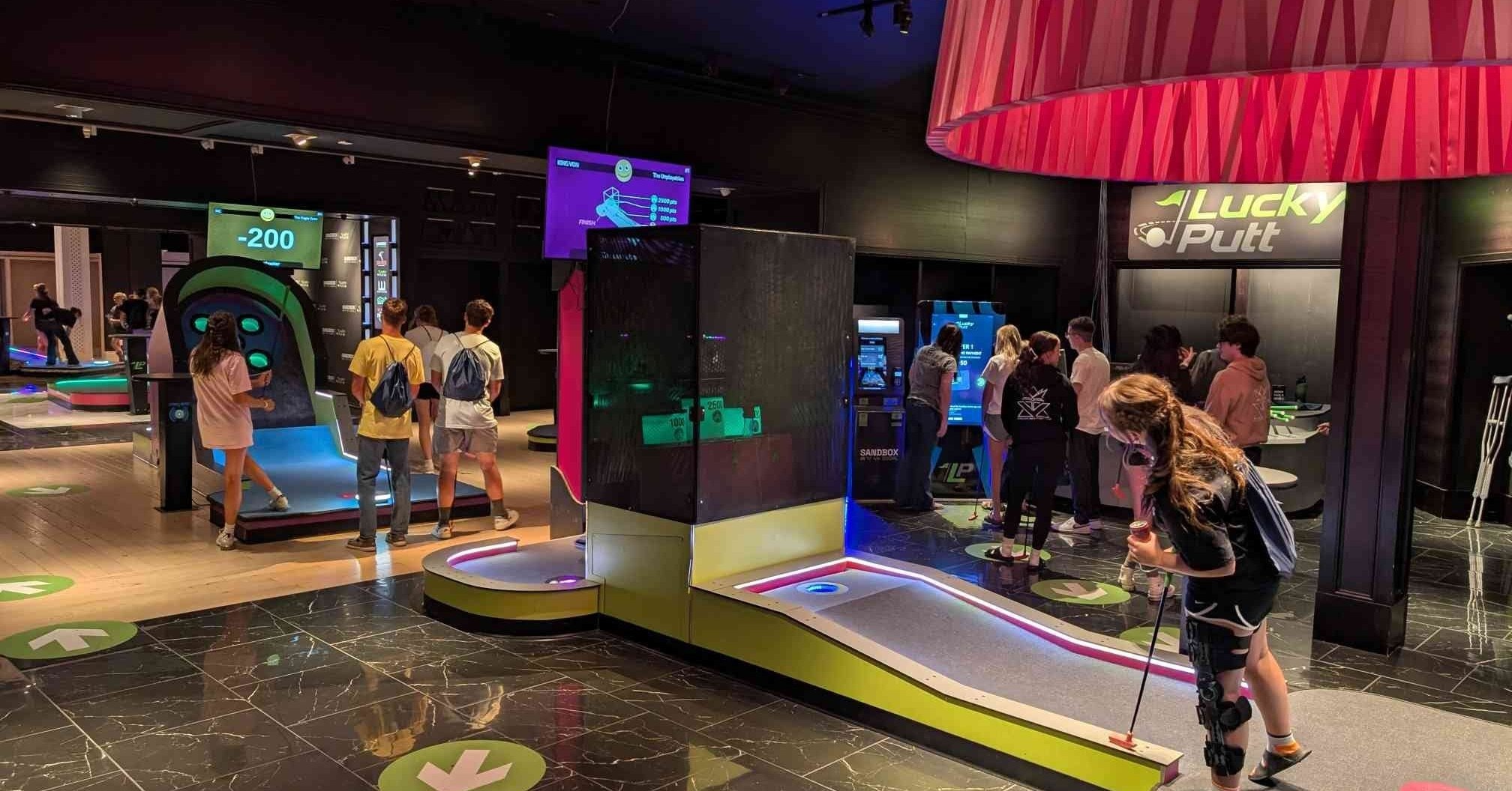 Players enjoying Lucky Putt at a Family Entertainment Center