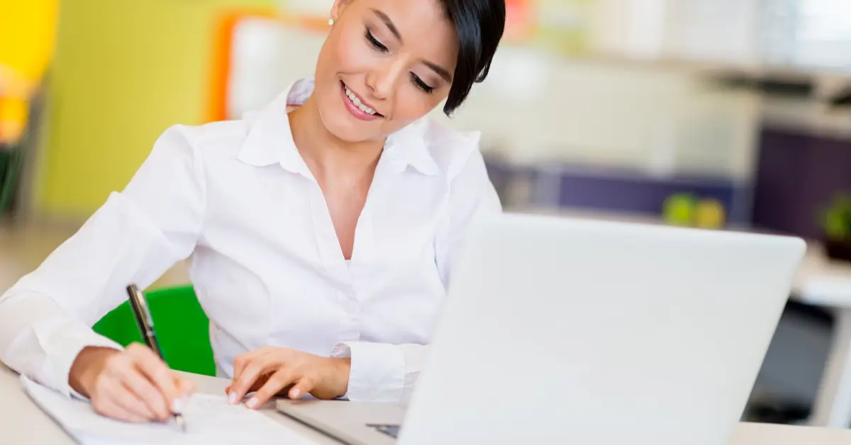 Woman registering her legal business name to stay compliant with tax laws.