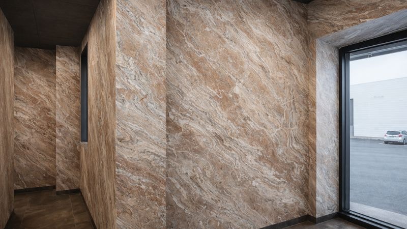 Showcasing brown marble vinyl wrap applied on walls