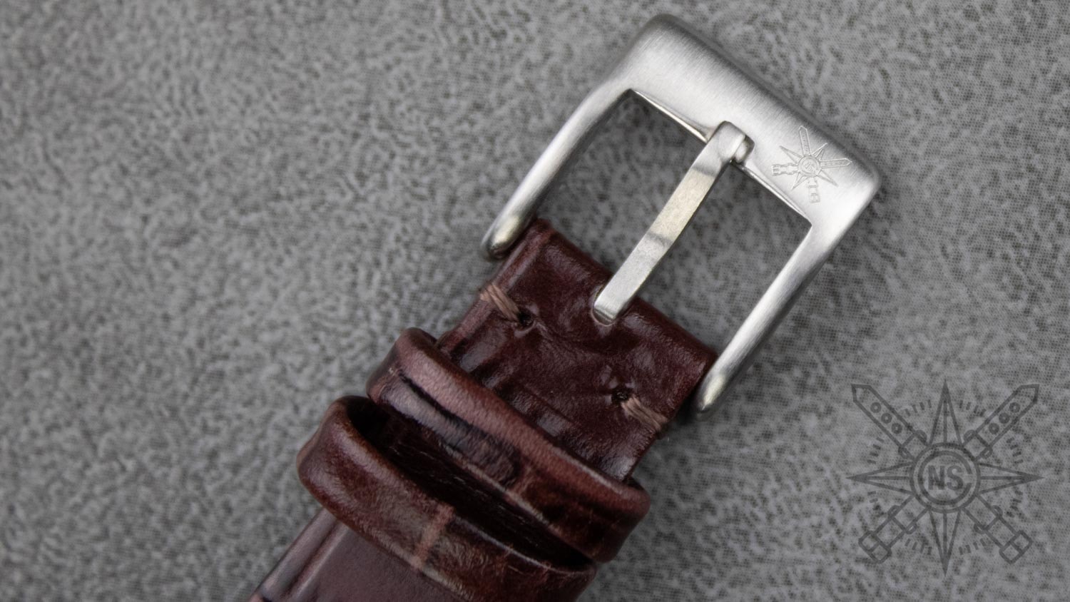 The dark brown alligator watch strap by CNS Watch Bands featured on a watch.