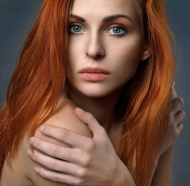 Red haired woman after botox hair treatment