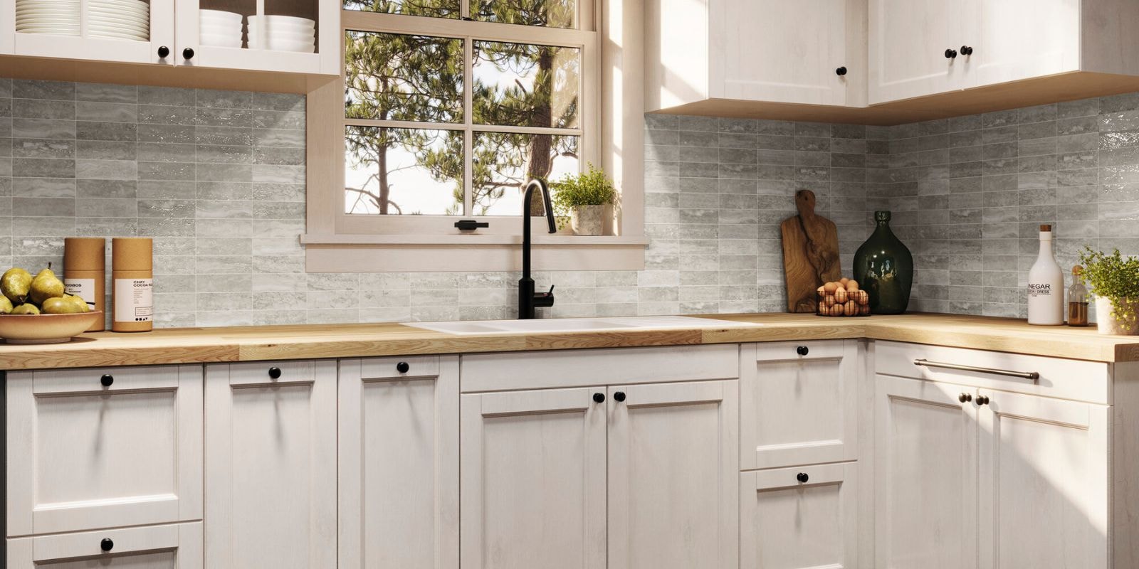 Traditional aesthetic kitchen with a grey tiled splashback and a wooden worktop