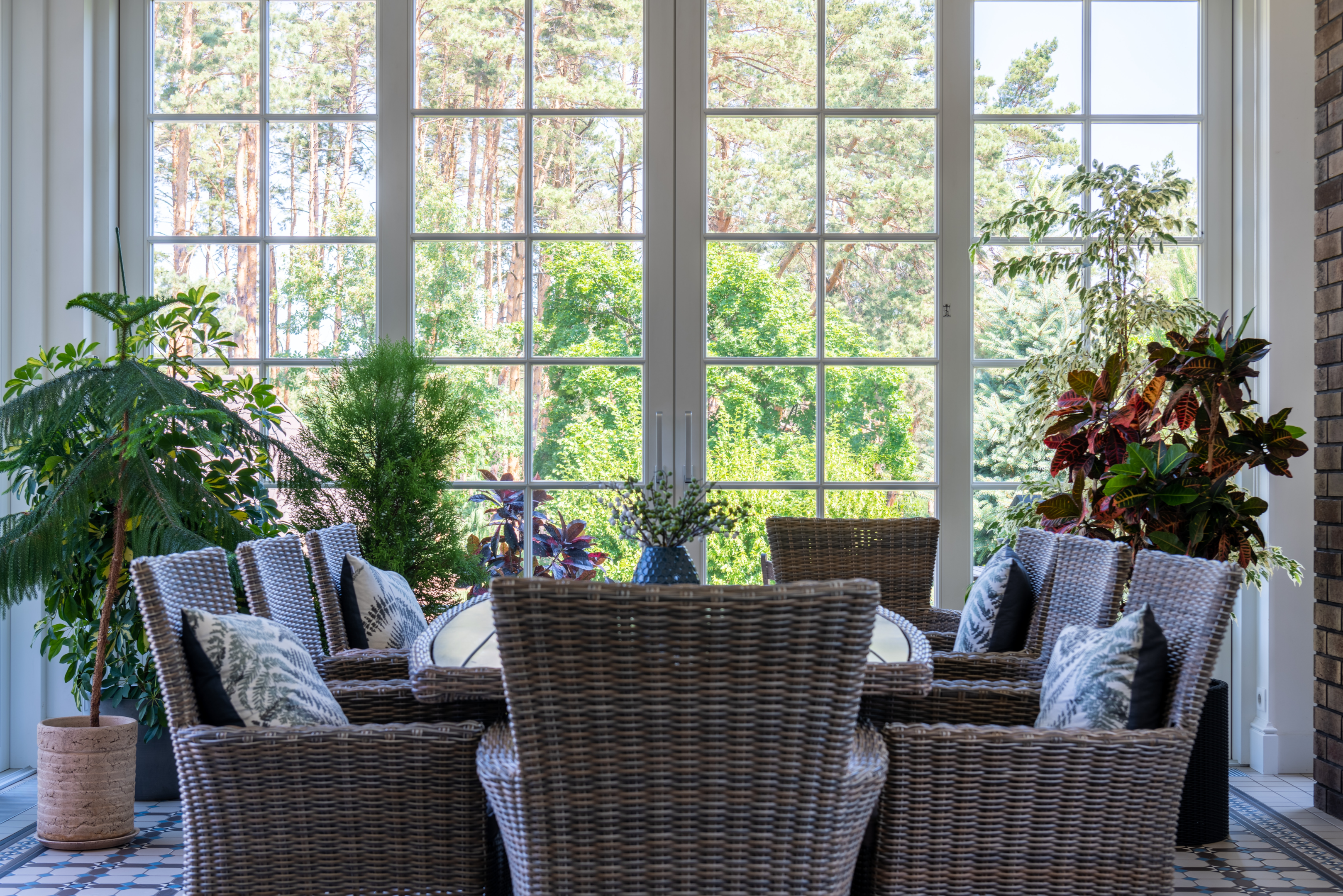 Including elements that provide comfort like pillows makes the dining area more homey | Photo by Max Vakhtbovych from Pexels