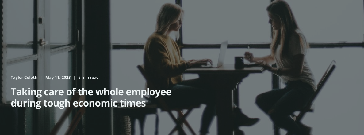 An image of two women at a table, one is on a laptop and the other one writes. Over it, the title reads: "Taking care of the whole employee during tough economic times"