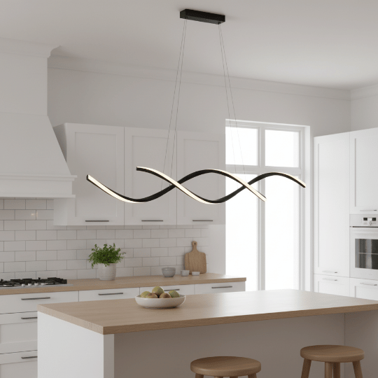 Modern Scandinavian wave-shaped LED pendant light in black, suspended above a bright white kitchen island.