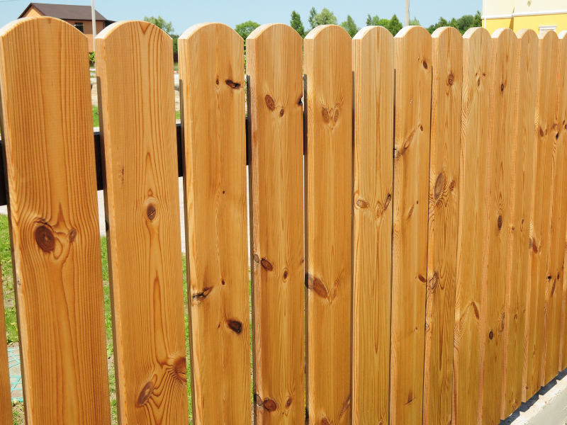 An image showing a type of wood fence.