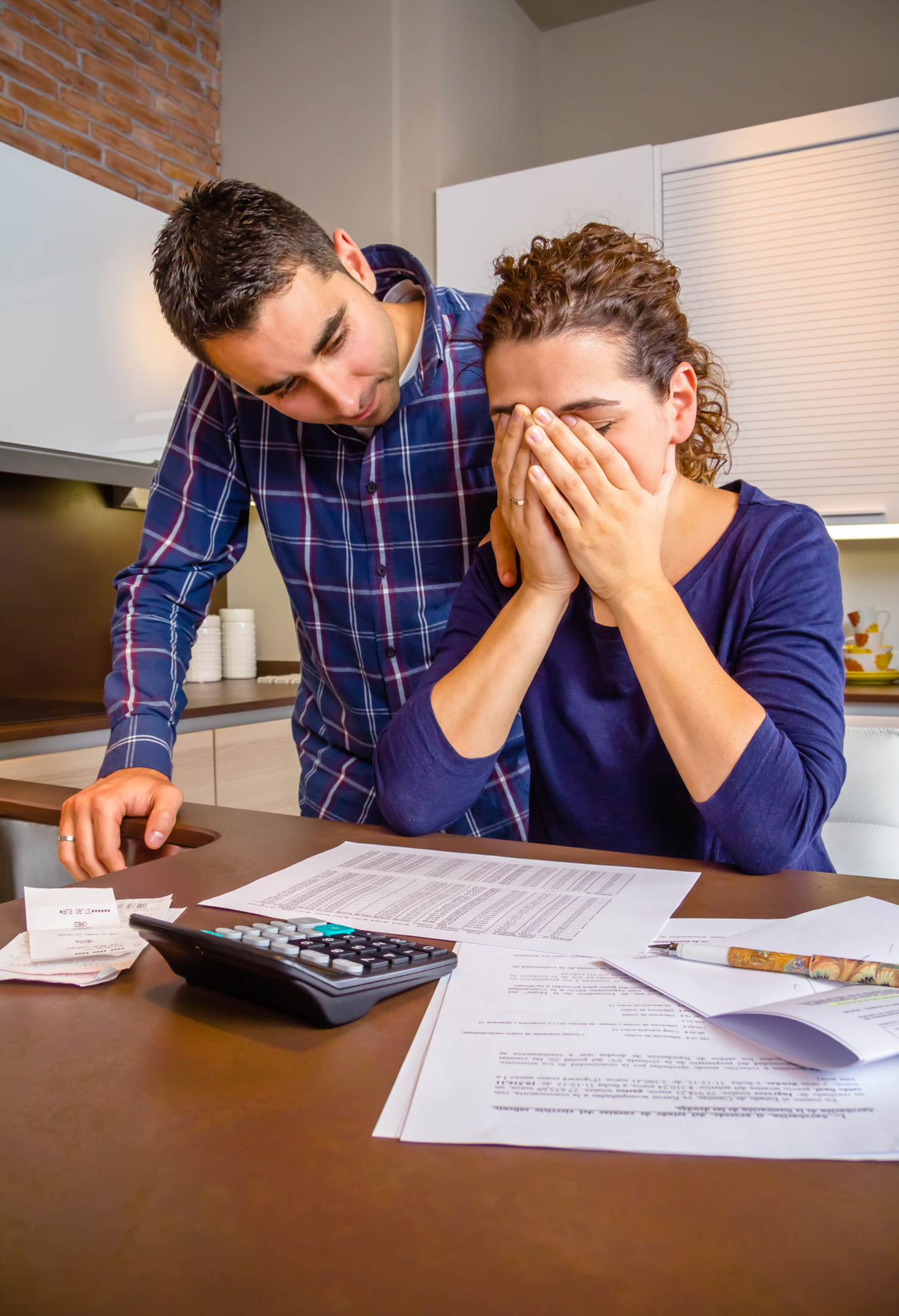 young couple facing irs wage garnishments