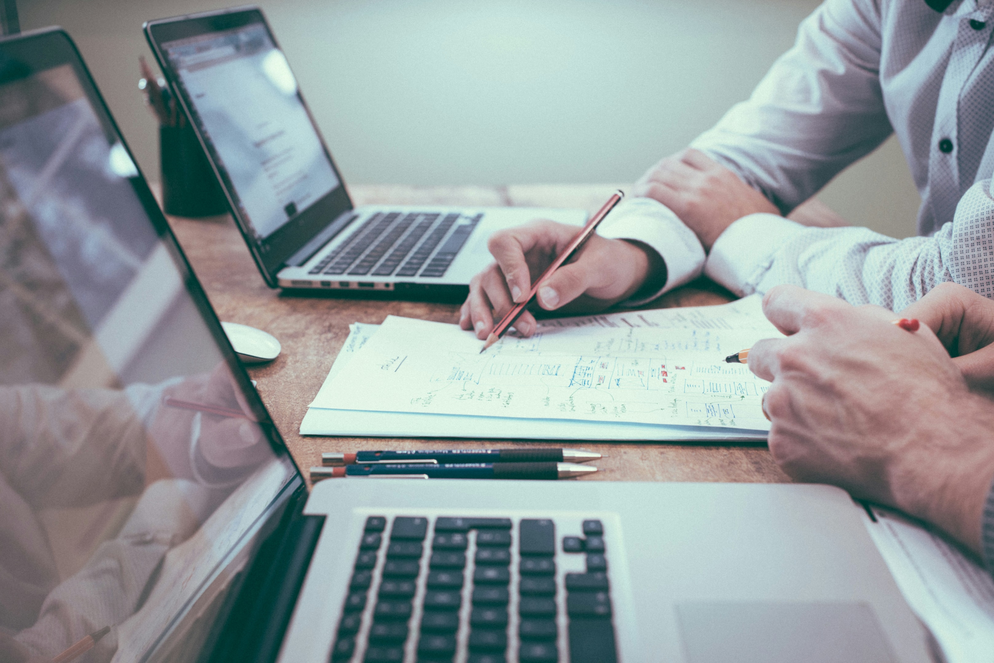 Real estate investor reviews financing numbers when looking to invest in a new property. 