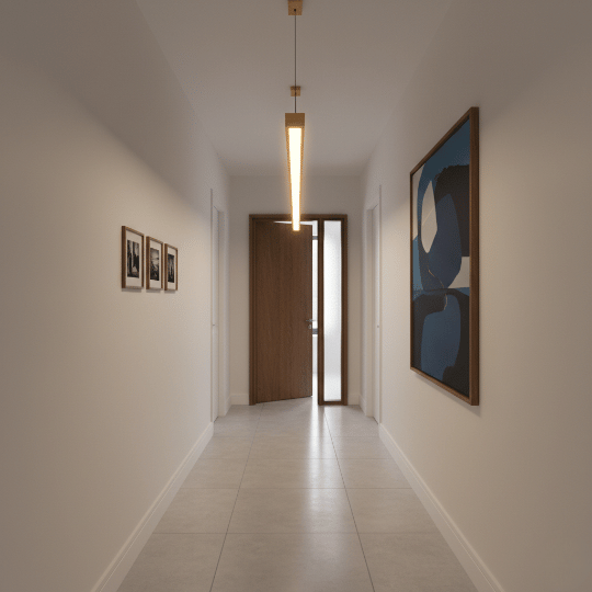 Slim linear pendant light creating visual continuity along a minimalist corridor.