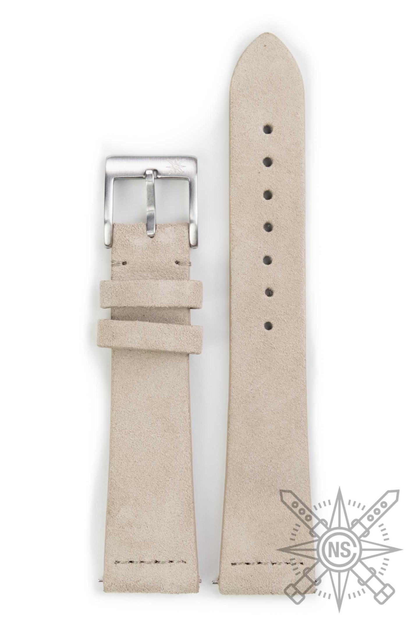 A collection of suede watch straps in various colors and sizes is elegantly arranged alongside luxury timepieces, showcasing the soft texture and luxurious feel of the suede leather. This display offers watch enthusiasts a variety of options to complement their watches, highlighting the quality and style of both the straps and the timepieces.