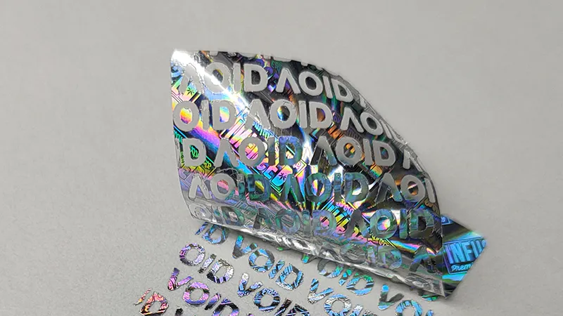 holographic sticker with VOID message written