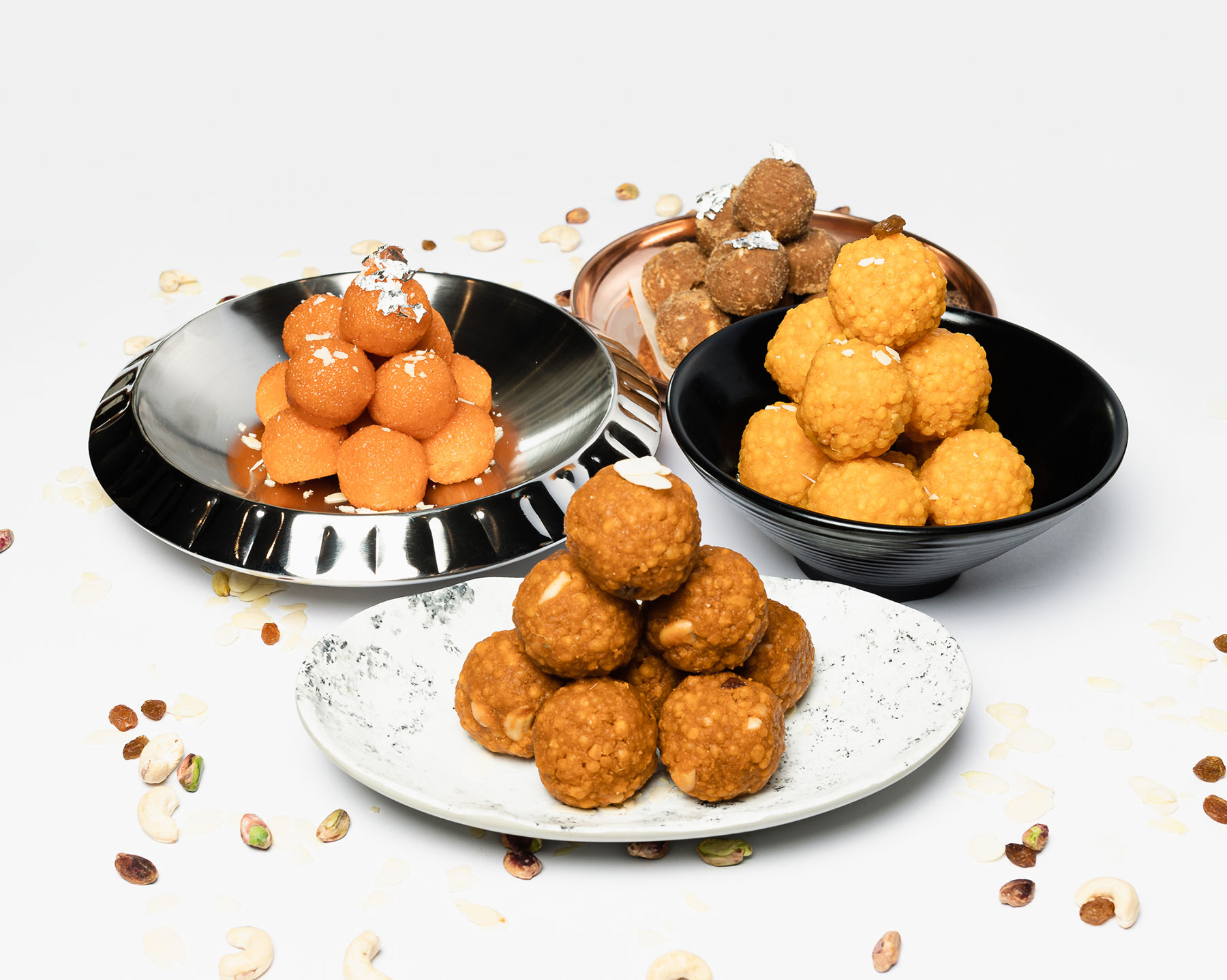 Laddus trio: Besan, Boondi, Anamaya. A delectable array of Indian sweets.