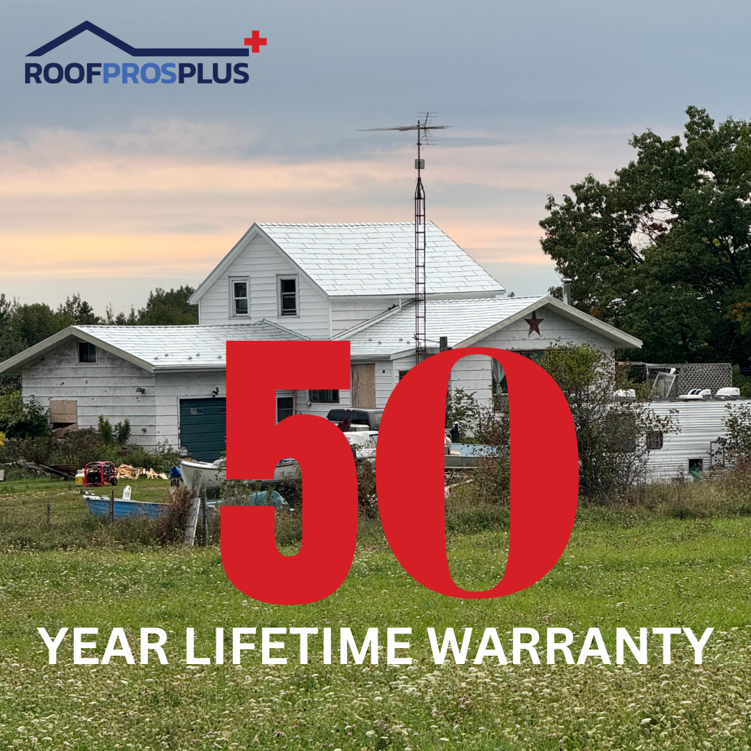 A white house with a matching metal roof is showcased in a grassy yard, with large red "50 Year Lifetime Warranty" text on top of the home, and the Roof Pros Plus logo sitting in the top left-hand side of the graphic.