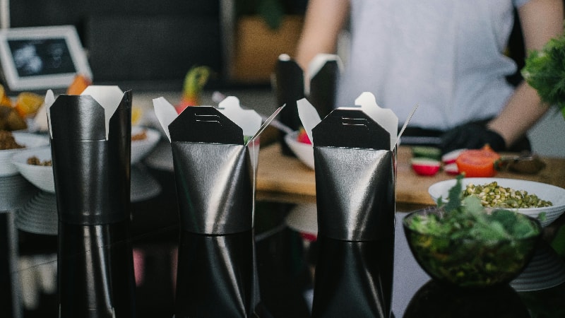 Black takeaway boxes