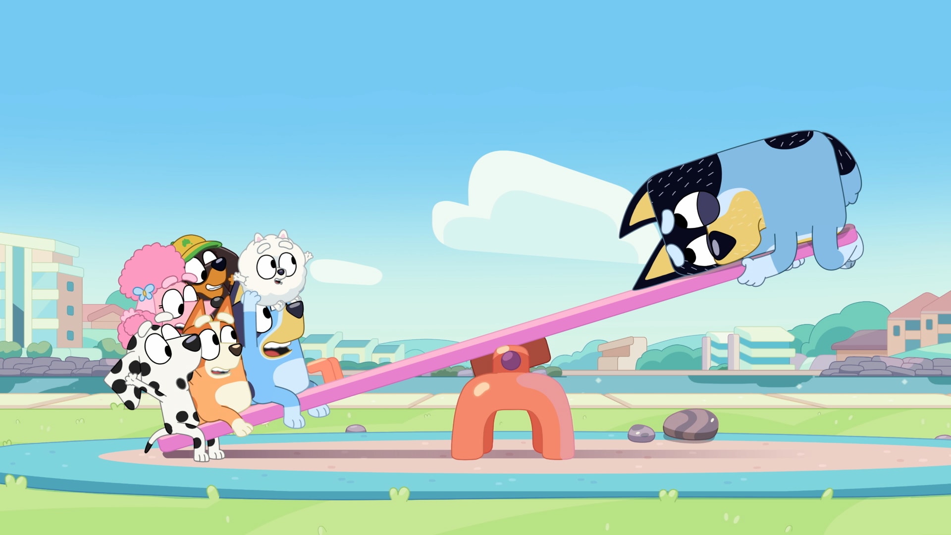 Bluey and friends on a seesaw