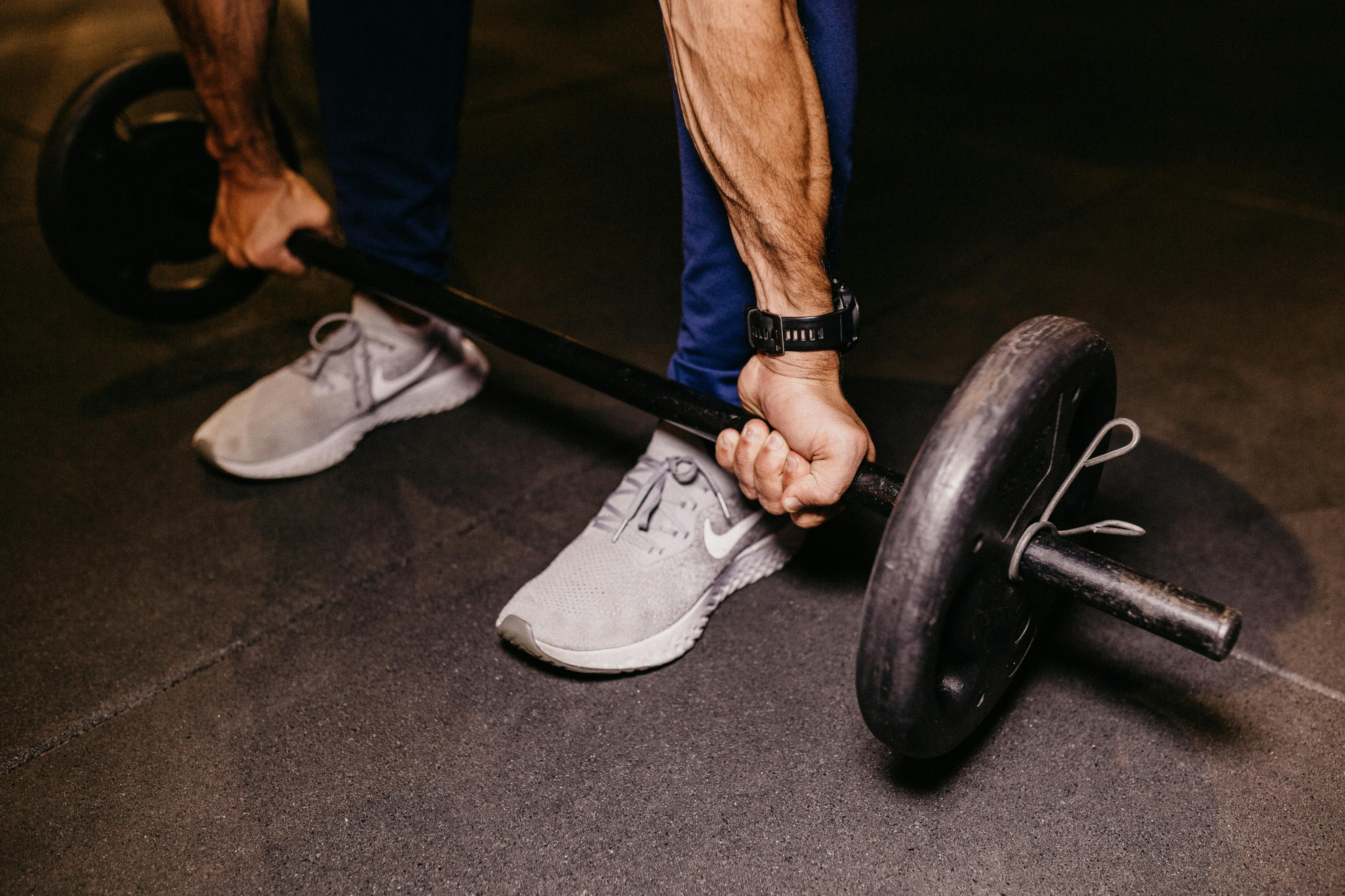 Photo by Jonathan Borba: https://www.pexels.com/photo/person-lifting-a-barbell-13885344/