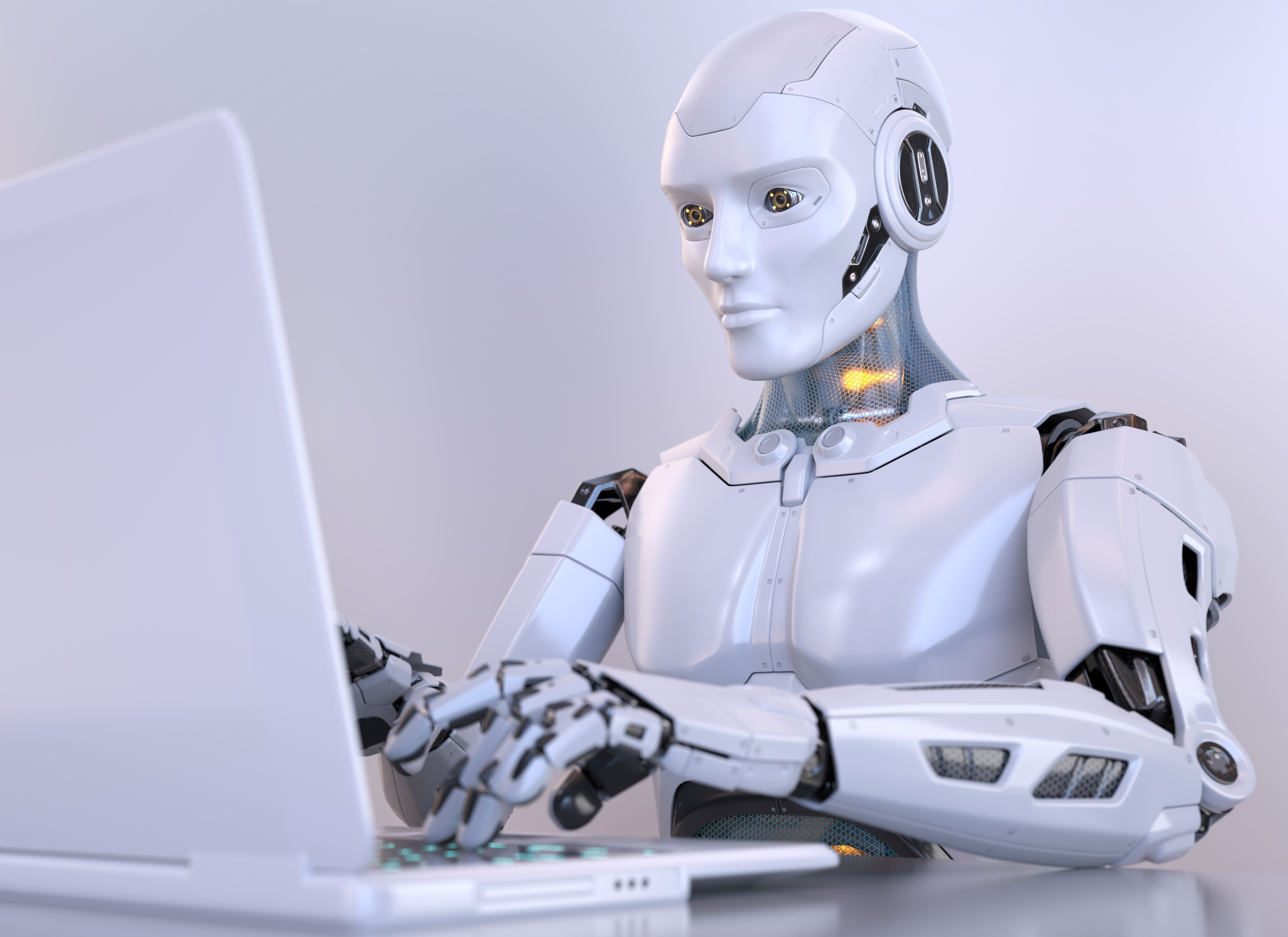 Robot typing on laptop